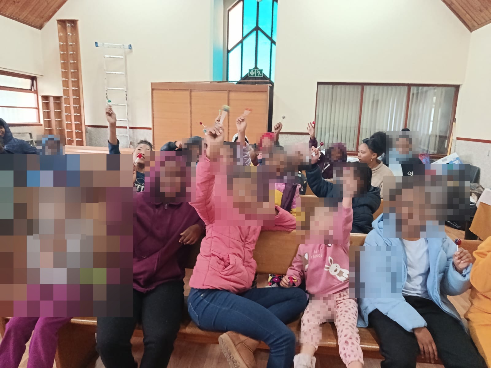 Children gathered at a faith and community event